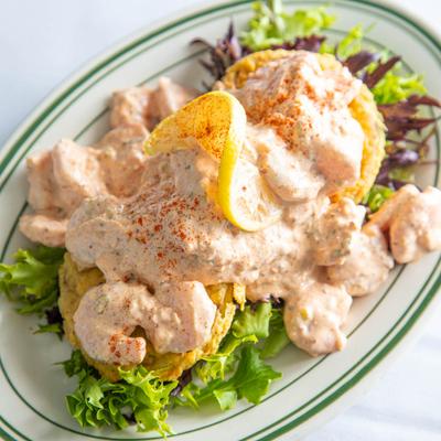 Fried Green Tomatoes topped with Boiled Shrimp and Remoulade Sauce.