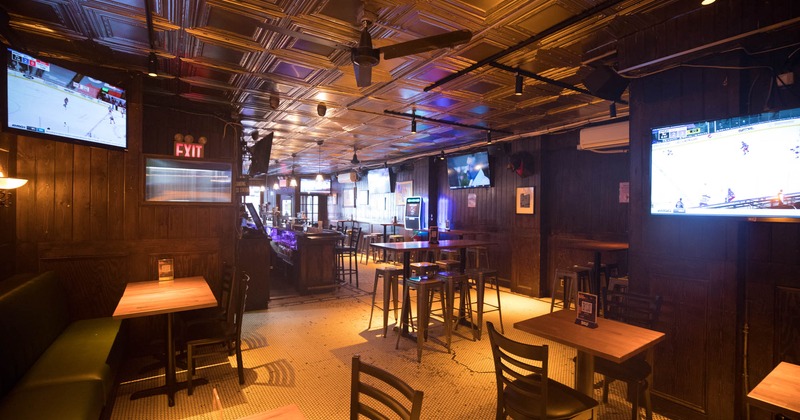 Interior, seating area with large TVs