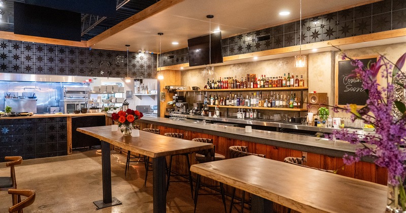 Modern style of interior design, bar area and open kitchen