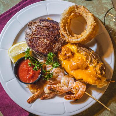 Shrimp skewer, 9 oz. Filet served with loaded baked potato