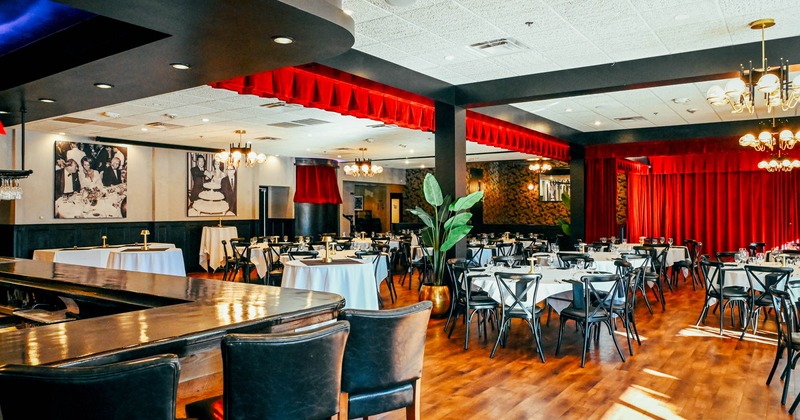 Interior, dining area, bar on the left