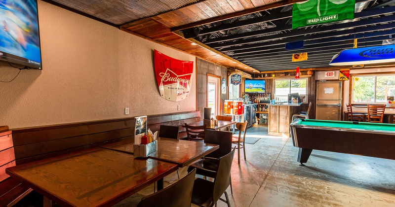 Interior, tables and seats, front desk, pool table