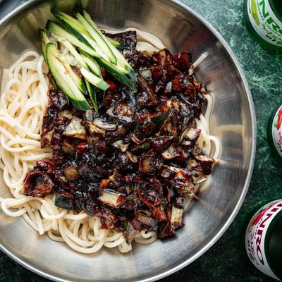 Pork and onion black bean sauce with noodles.