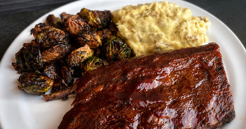 All-American Whiskey BBQ Ribs glazed with house-made whiskey barbecue sauce.
