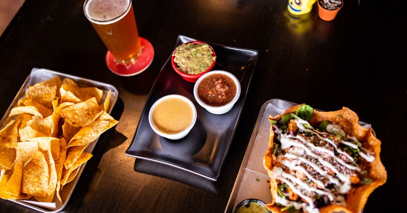 Various dishes and a beer