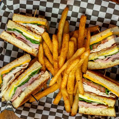 Pub Club sandwich with fries.
