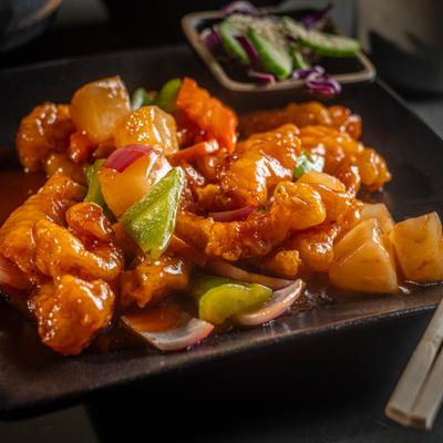 Sweet and sour chicken with pineapple and vegetables.