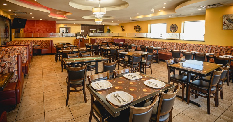 Interior, dining area with tables and chairs