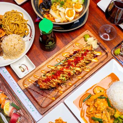 Vibrant Asian dishes on a table.
