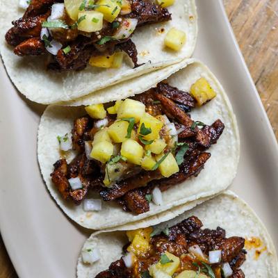 Three tacos al pastor.