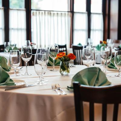 Interior, a table set for dining.