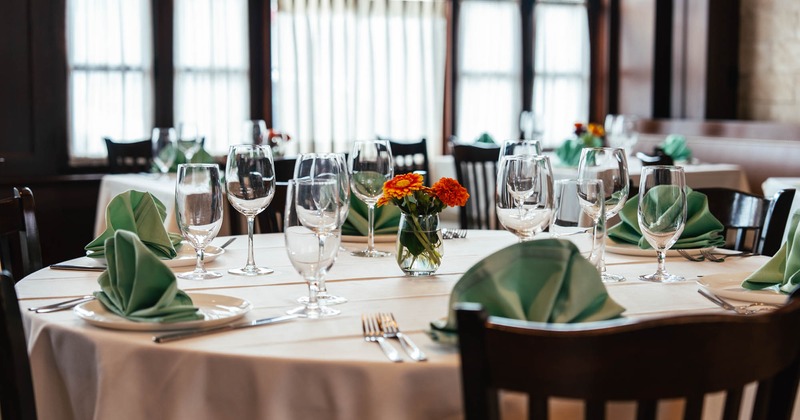 Interior, table set for guests