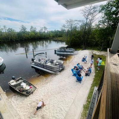 Boats docked on the beach.