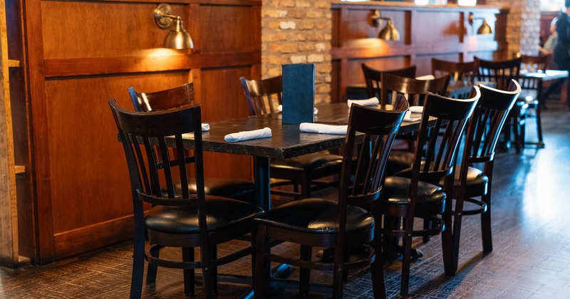 Interior, tables and chairs in dining area