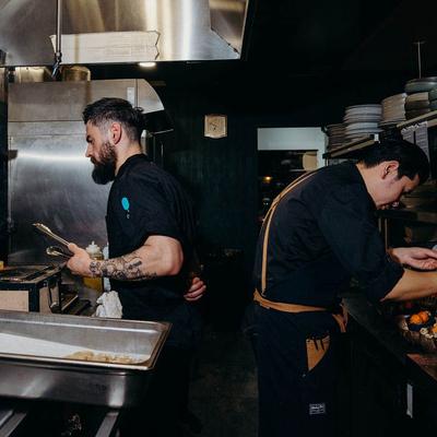 Chefs grilling food.