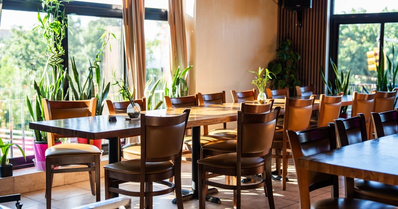 Interior, tables and chairs ready for guests
