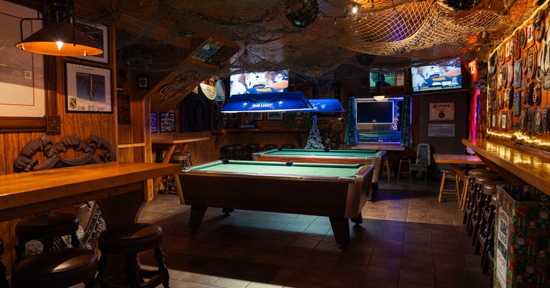 Interior, pool tables waiting for the guests