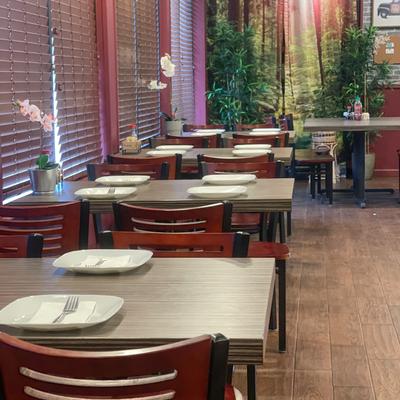 Lined up dining tables inside