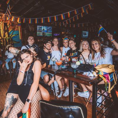 Interior, guests enjoying cocktail drinks