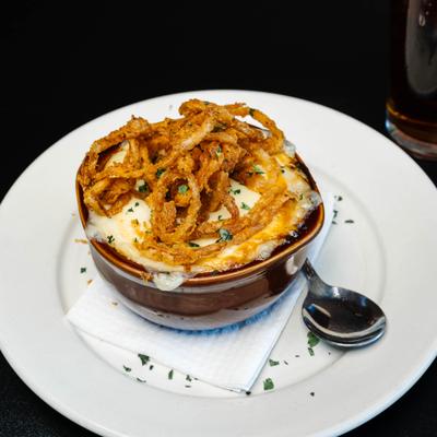 French onion soup topped with crispy fried onions.