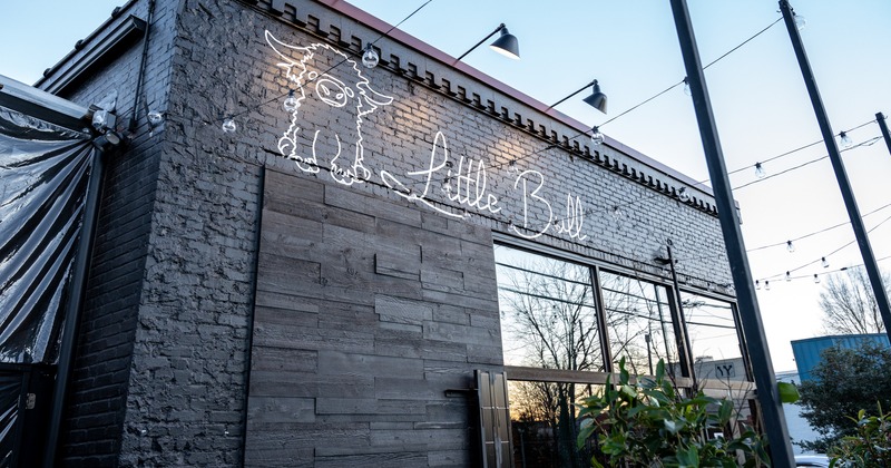 Exterior, low angle, entrance, sign above