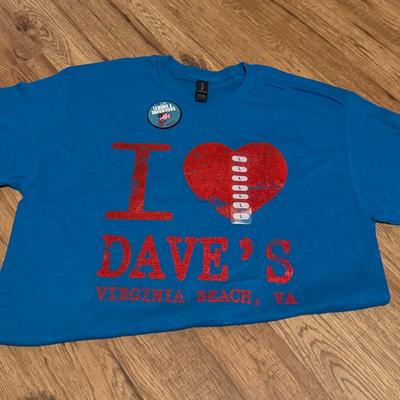 A blue t-shirt with a red I love Dave's Virginia Beach, VA graphic.