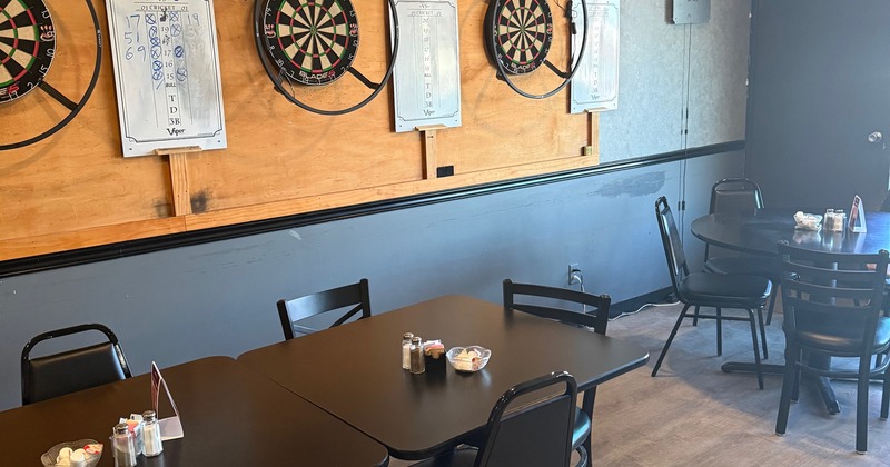 Interior, seating area, dart boards on the wall