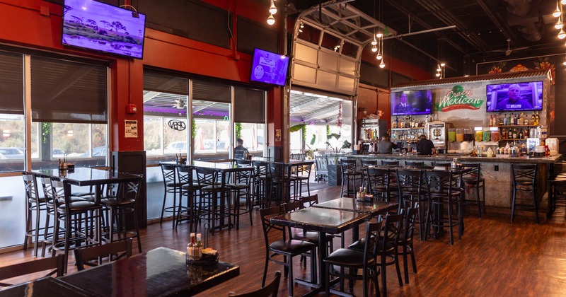 Interior, tables and chairs near the windows
