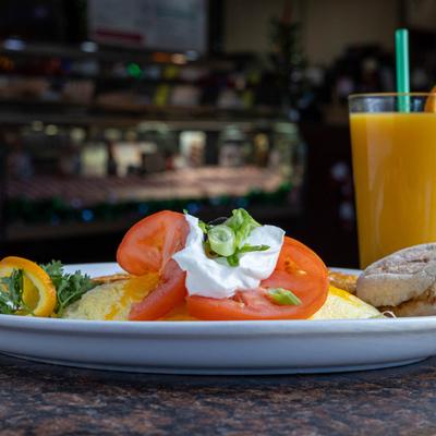 Vegetarian Omelette served on the table with a drink.