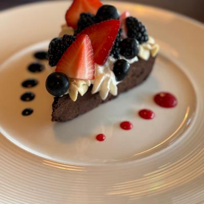 Flourless chocolate cake with fresh seasonal berries.