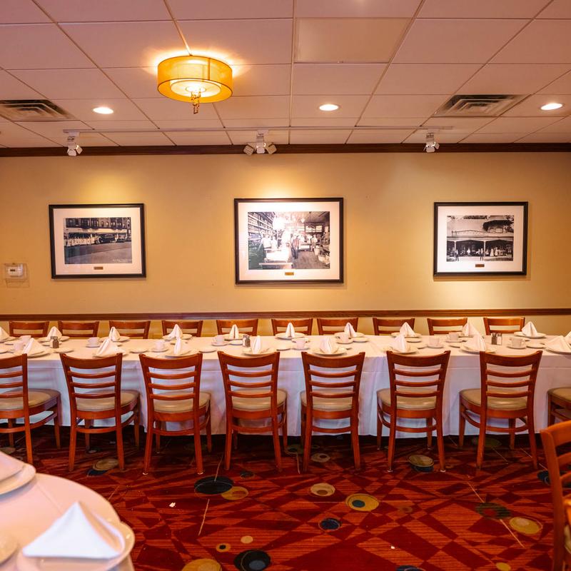 Interior, a long table ready for guests