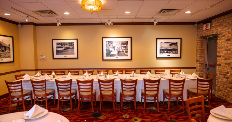 Interior, a long table ready for guests