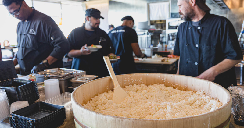 Staff members working in the kitchen