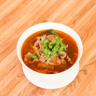 Noodle Soup with beef, bok choy, onions, bean sprouts, cilantro, and crispy garlic.