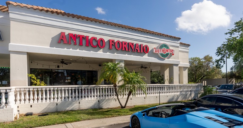 Exterior, front view to restaurant, porch, entrance, sign above