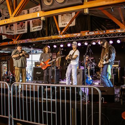 Interior with a band performing on stage.
