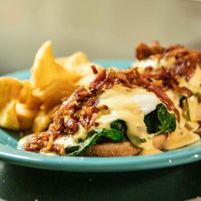 Served eggs benedict sandwiches.