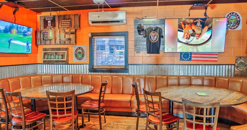 Interior, seating area, TVs on the wall