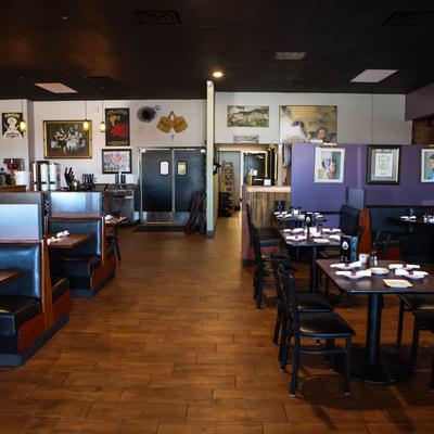 Dining area, tables and seats ready for guests.