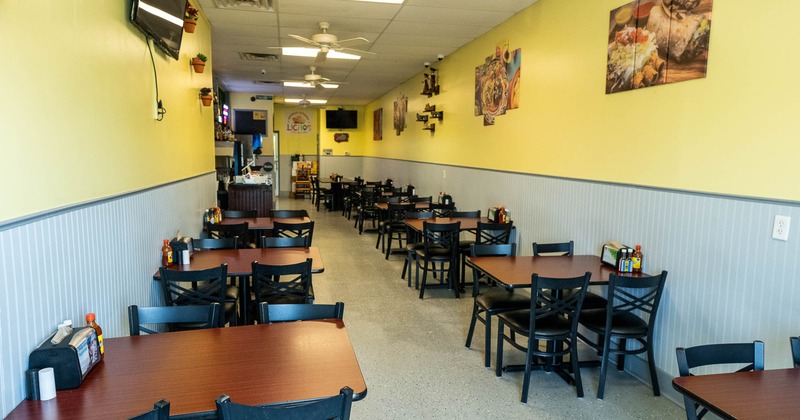 Interior, dining area with tables and chairs