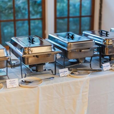 Interior, A table with chafing dishes.