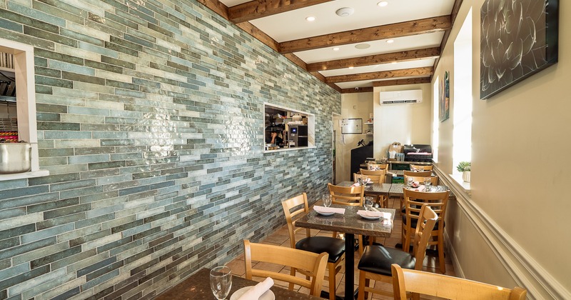 Cozy interior dining area with set dining tables