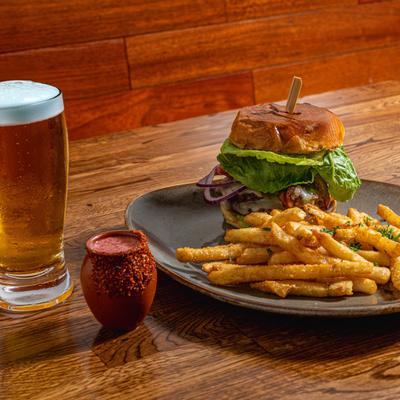 Delicious Cheeseburger with a Mexican Candy shot, and a refreshing beer.