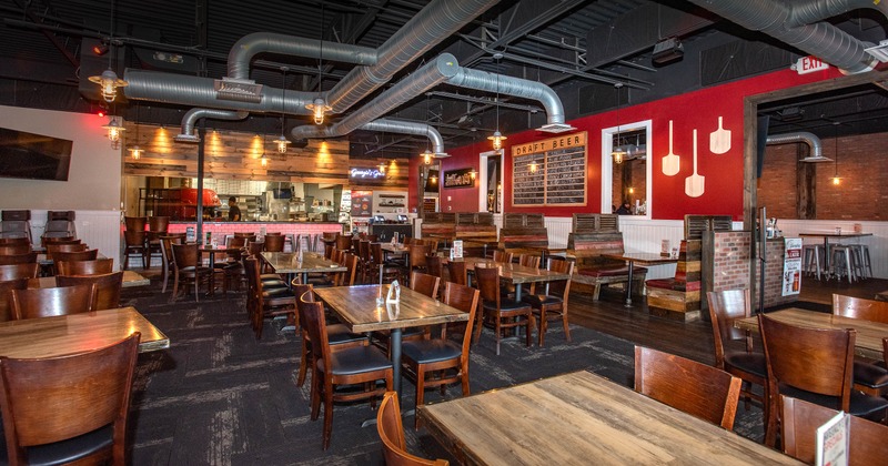 Interior, spacious dining area with tables and chairs