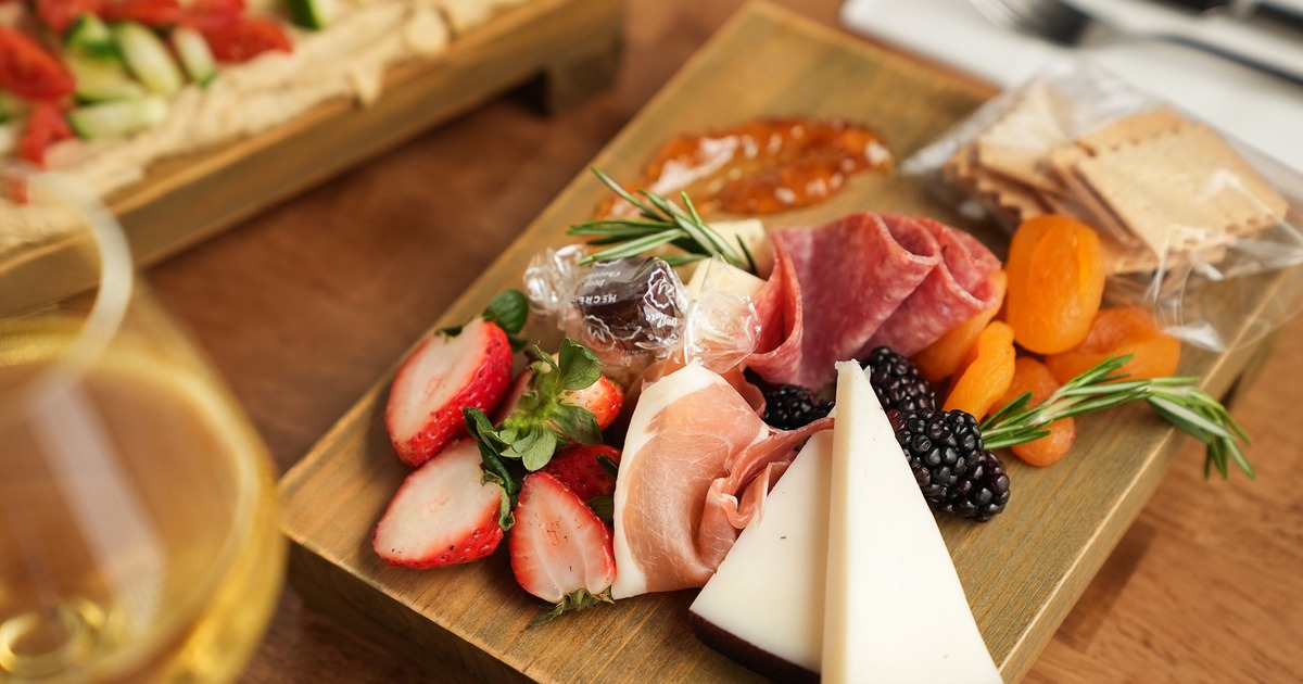 The single board with food for sampling