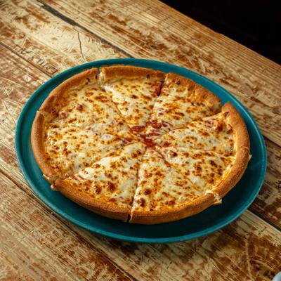 Cheese pizza on a wooden table.