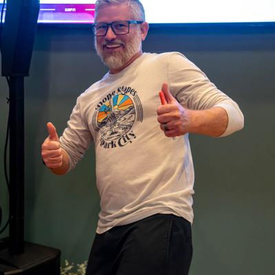 Customer holding two thumbs up.