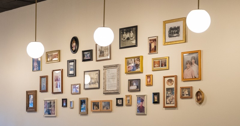 Interior, wall decorated with framed photos