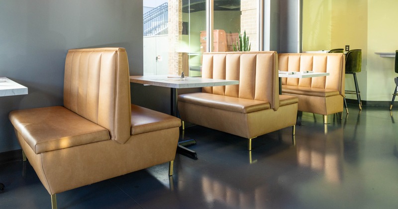 Interior dining area with tables and double booths