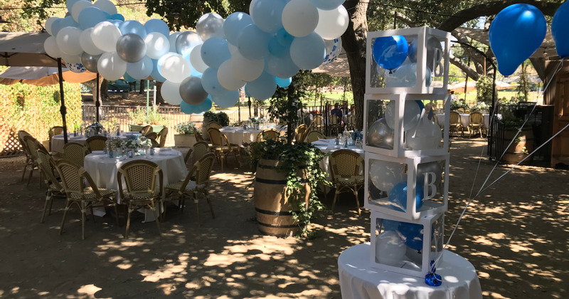 Exterior, seating area decorated for a birthday party
